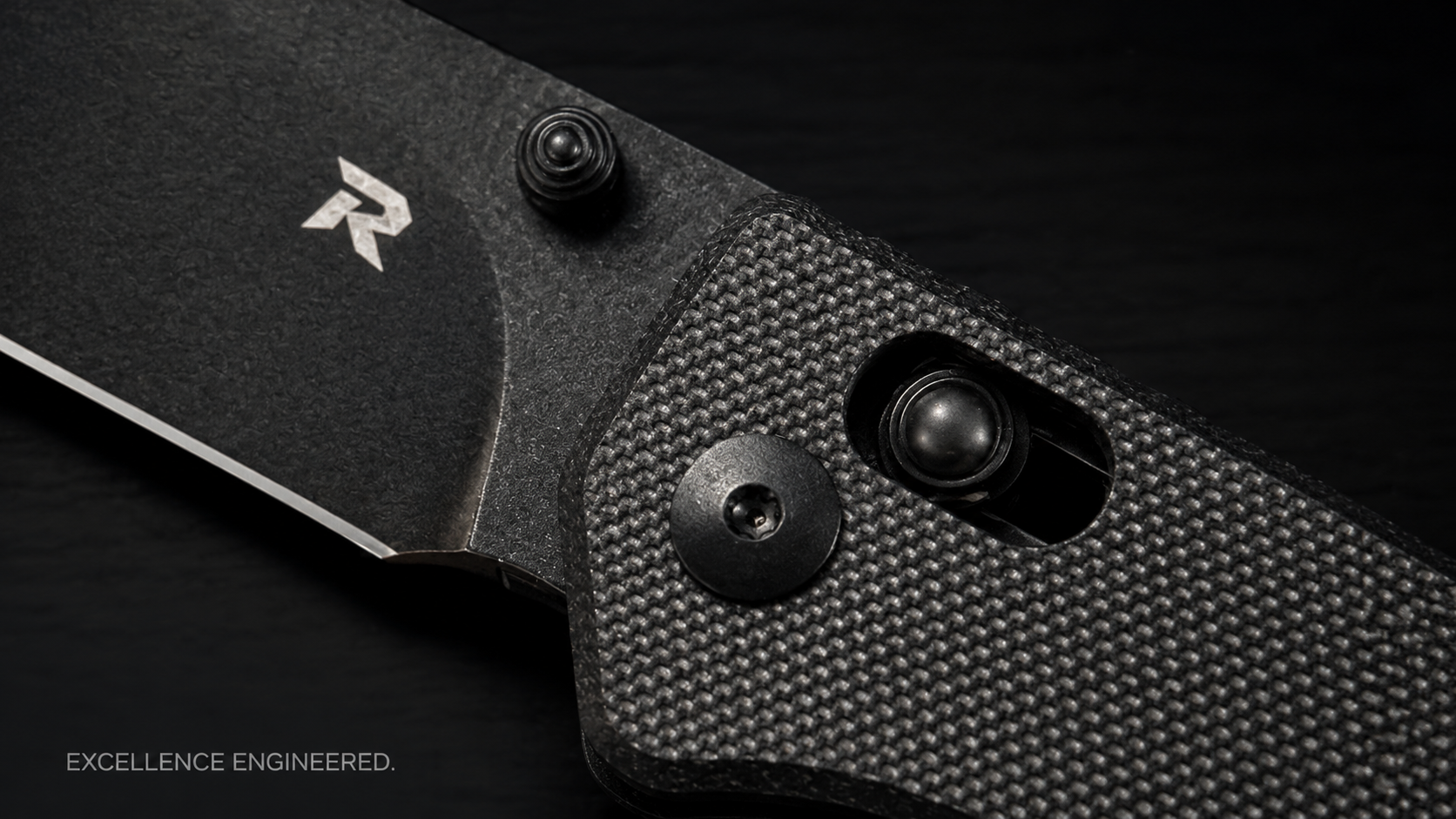 Close detail of the Recon Viper One pivot and G10 handle